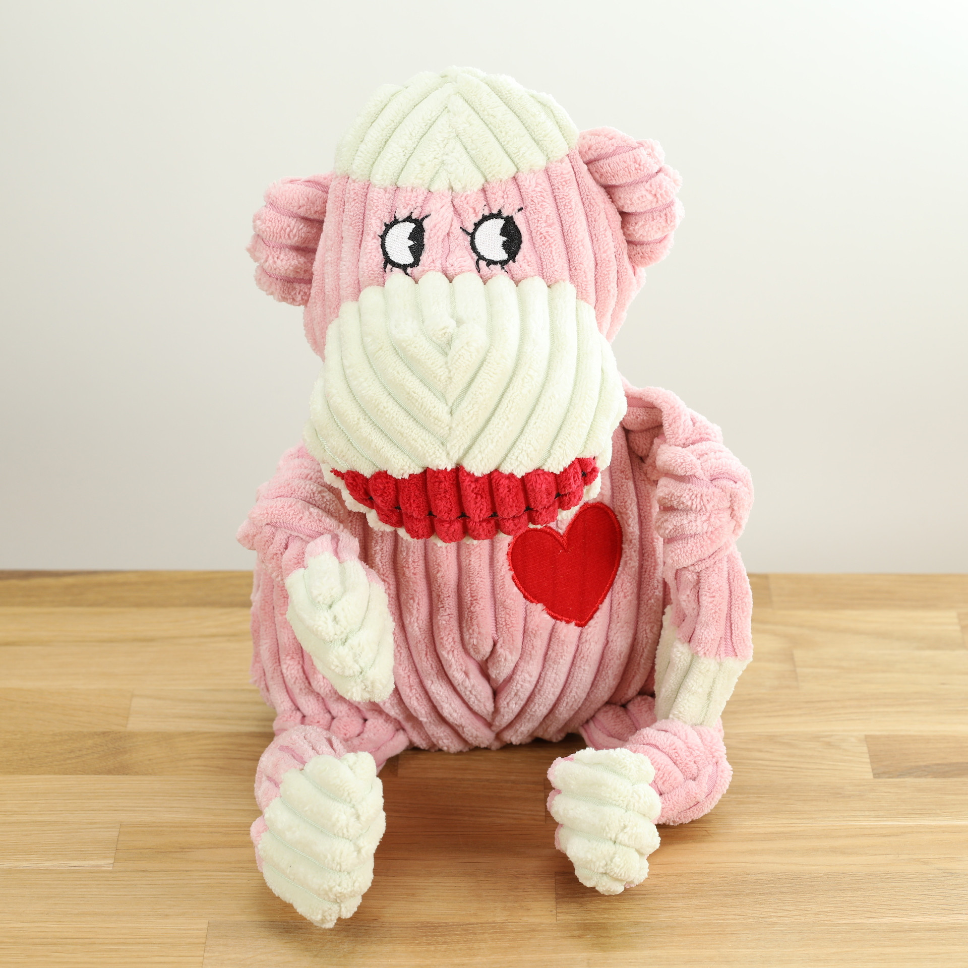 Dog toy Miss Sock, the pink monkey