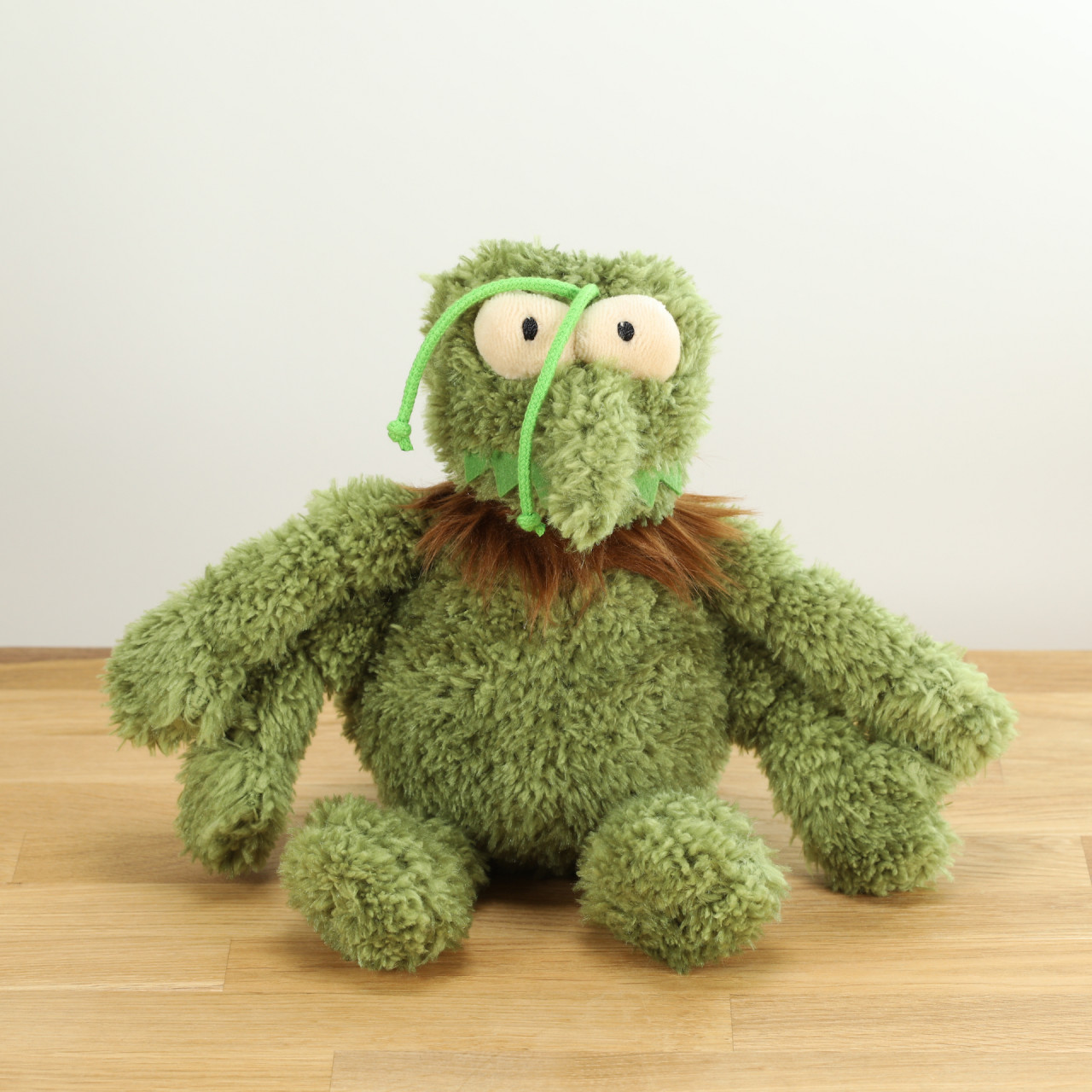 Dog toy Scratchy, the green flea